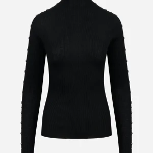 Dolcevita nero in lana merinos con applicazioni su maniche