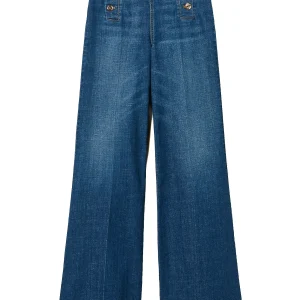 Jeans flared con bottoni décor